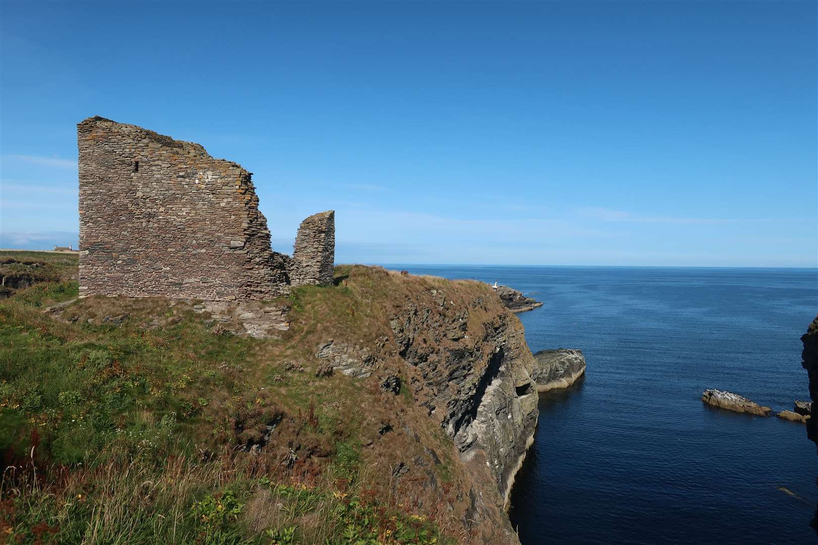 The Castle of Old Wick stands on a narrow promontory jutting out into the Moray Firth.