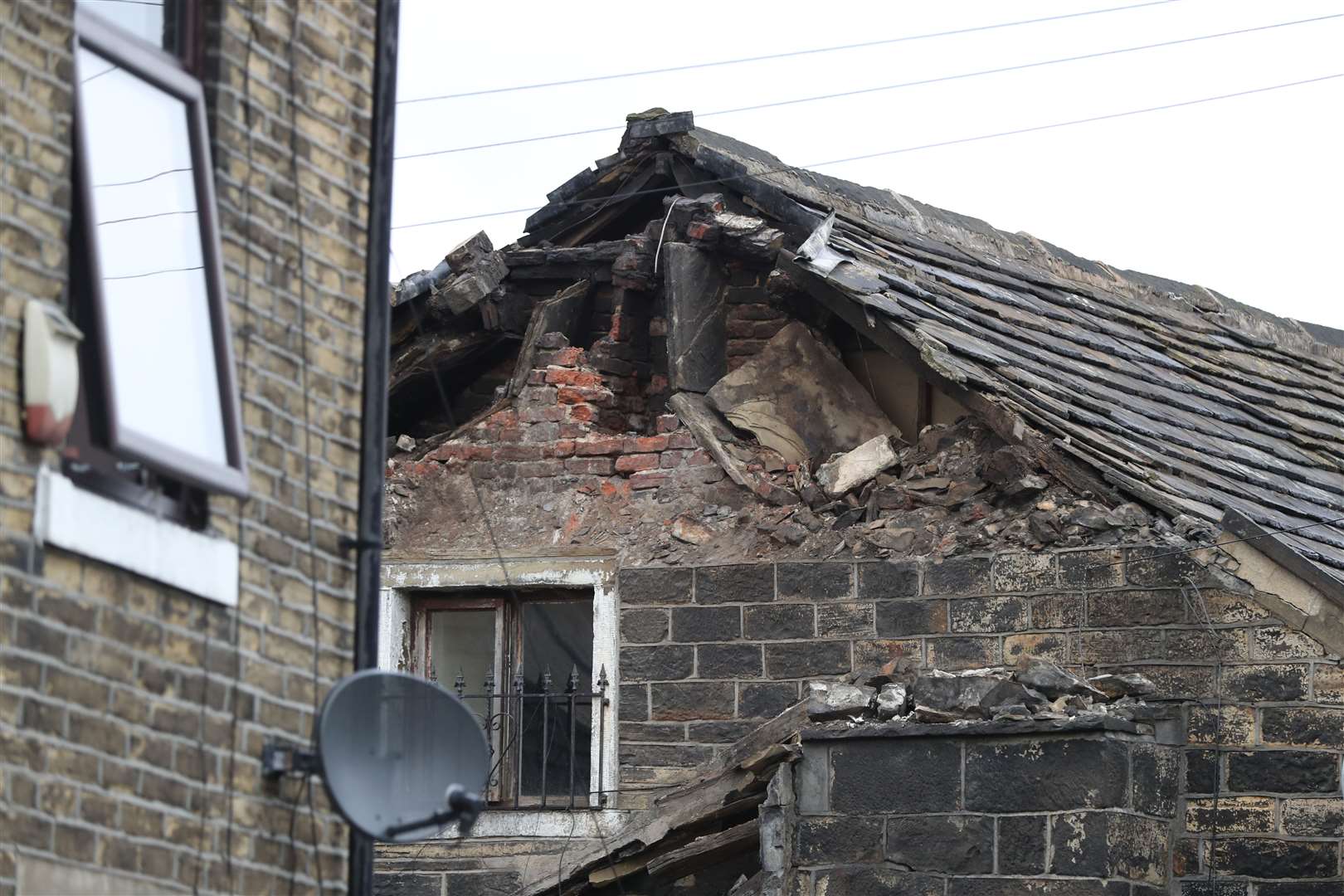 Damage to the roof of a house in Knights Fold, Bradford (Peter Byrne/PA)