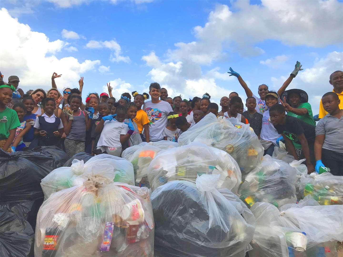 A beach clean-up in Jamaica, supported by Sandals. Picture: PA Photo/Hannah Stephenson