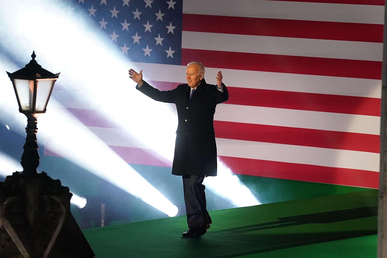 Joe Biden arrives on stage to deliver a speech at St Muredach’s Cathedral (Brian Lawless/PA)