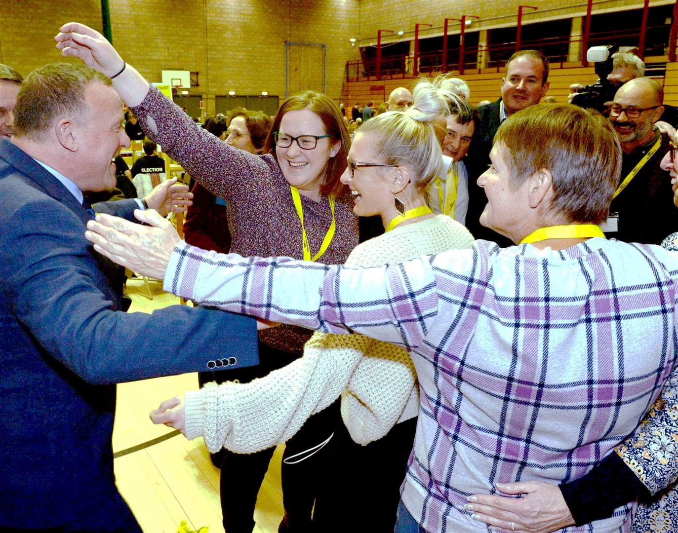 Newly re-elected MP Drew Hendry celebrates with his team after securing a huge majority and record third win in a row.