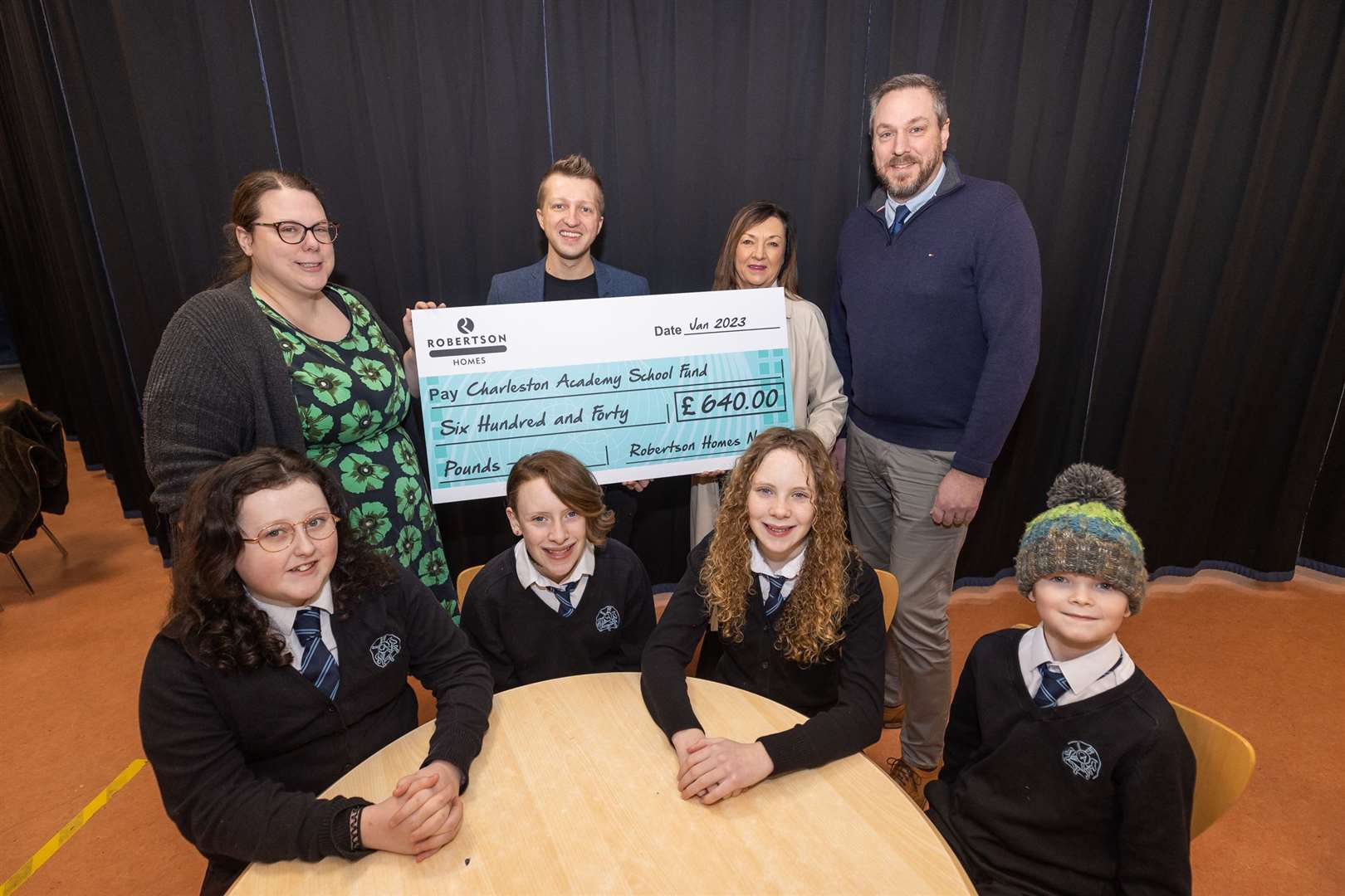 Back row (from left): Teachers Eilee MacLeod and Derek Sawyer with Jacqui McPherson and Neil Mackinlay (all Robertson Homes). Front row (from left): Pupils Aleisha Cornish, Nicole Lindsay, Meghan Lindsay and Archie Healy.