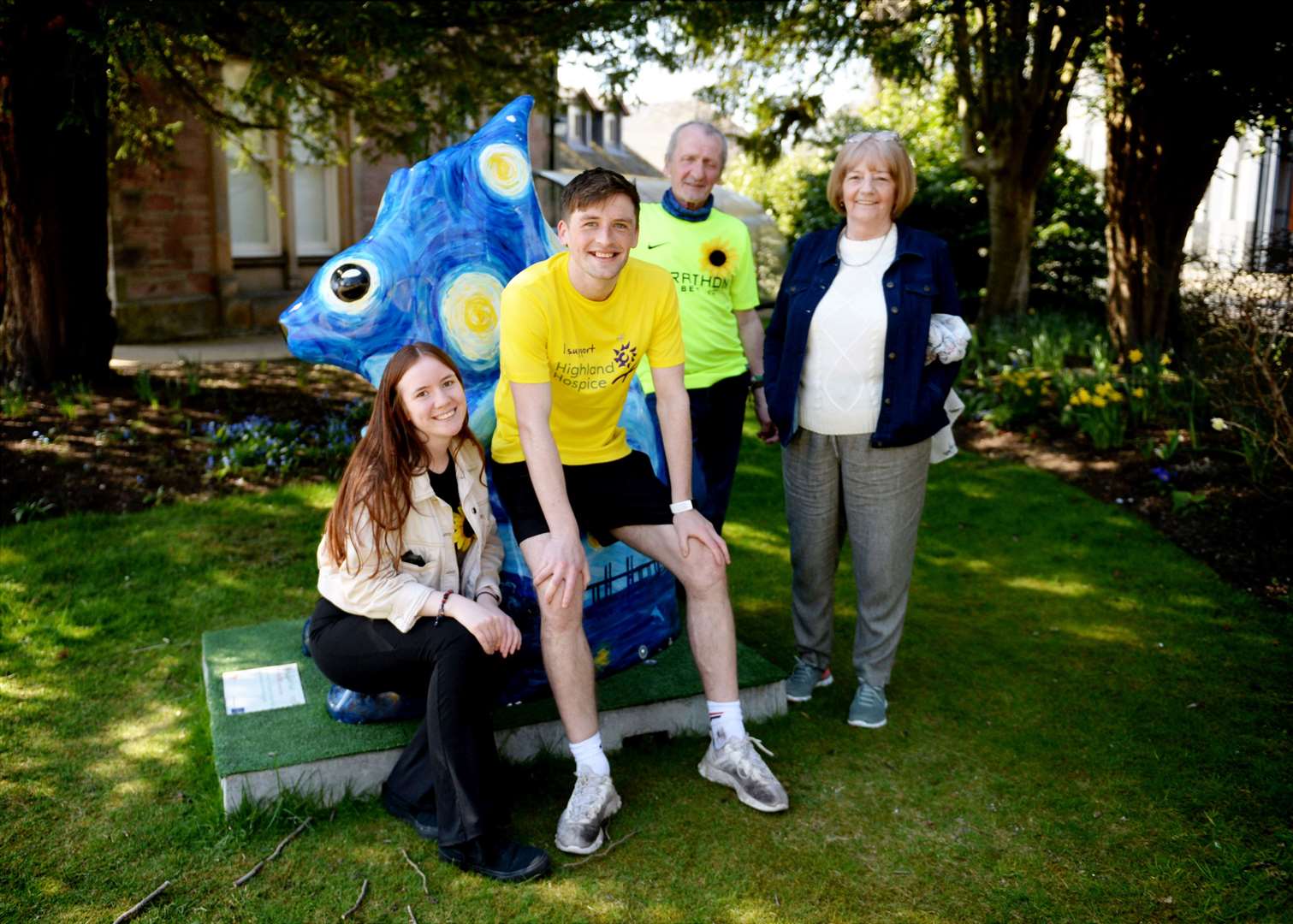 Connor Golabek with his sister, Lucy Golabek and grandparents, Stuart and Lorraine Golabek in front of the Highland Hospice squirrel. Picture: James Mackenzie..