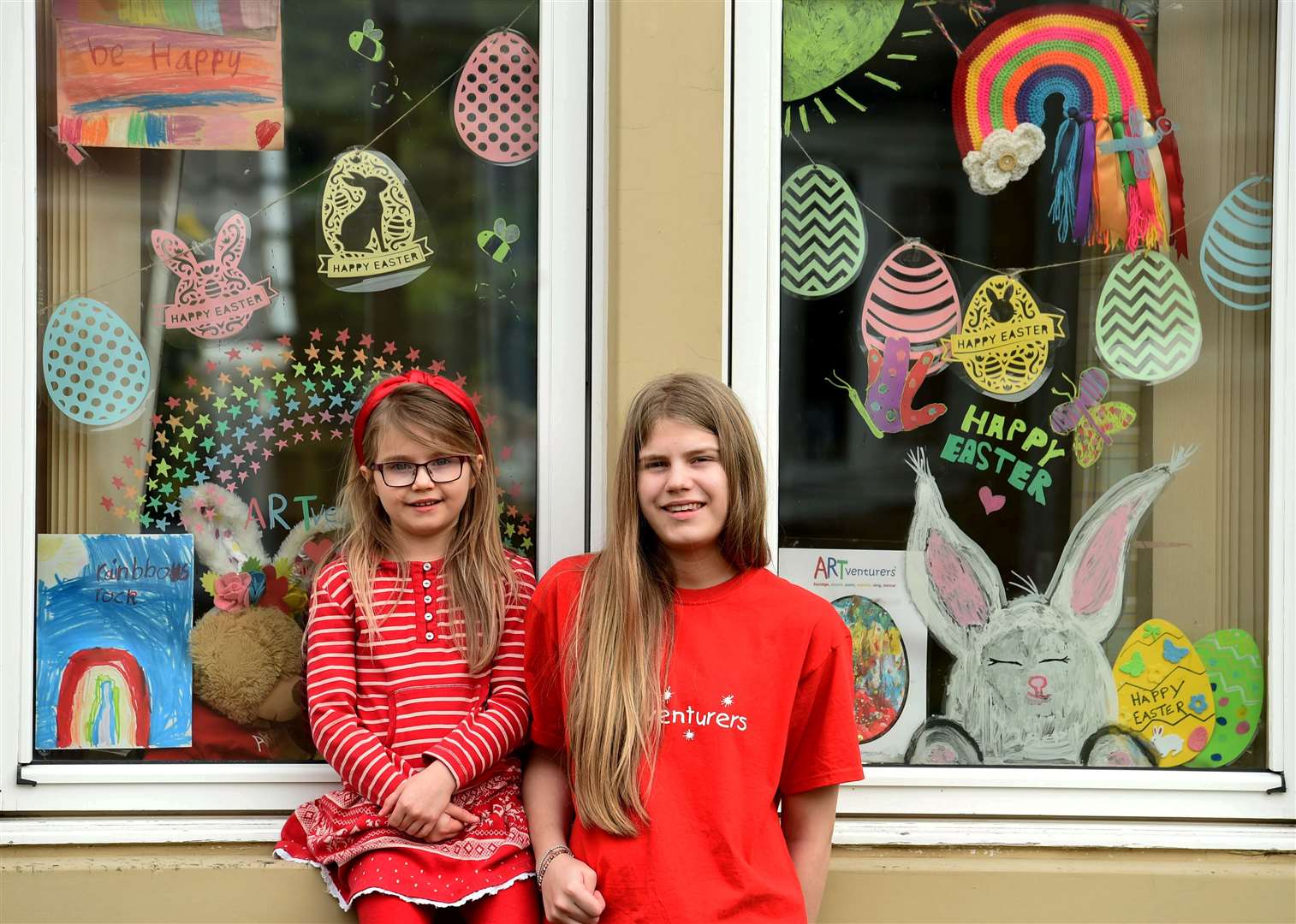 Abbie and Izzy Macrae with their own Easter-themed window.