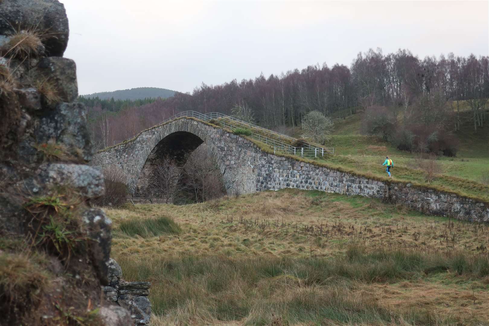 Running towards Sluggan Bridge from the nearby ruin.