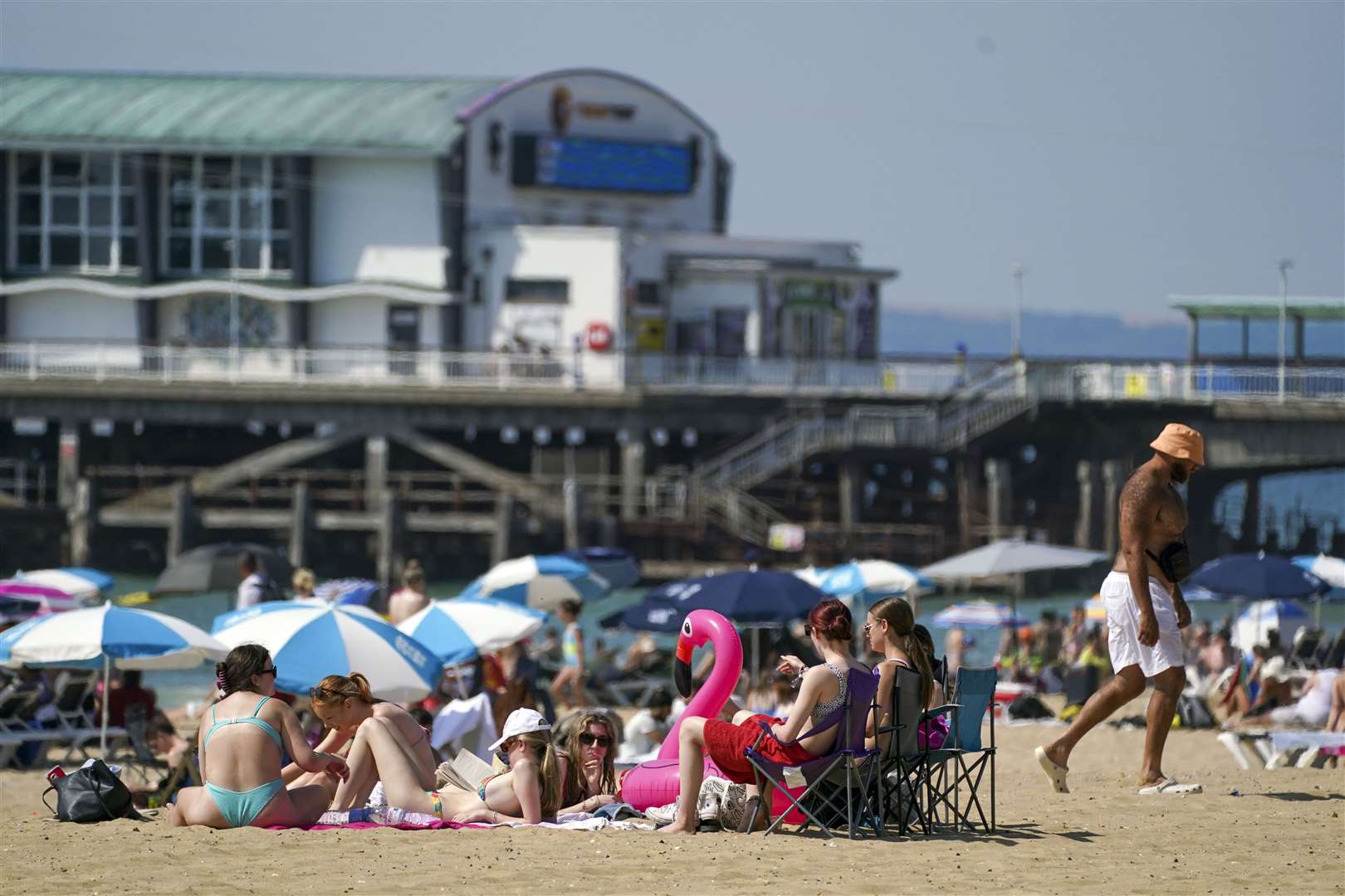 There were lots of parasols up to keep out the sun (Steve Parsons/PA)