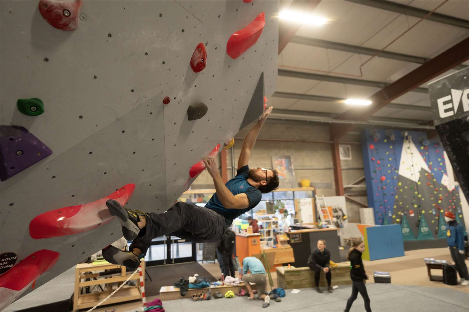 A competitor tests his climbing skills at The Ledge in Inverness.