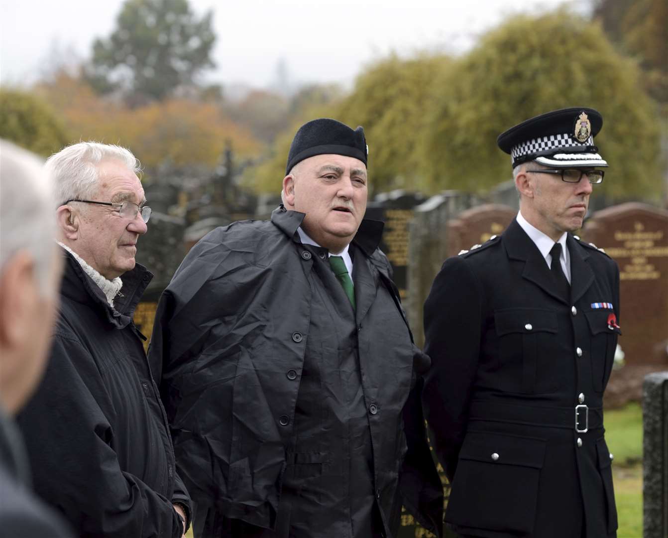 Fallen Officer Commemoration at Tomnahurich Cemetery..Dave Conner of the Retired Police Officers Association (middle) said some words at the grave side stood next to Chief Superintendant George MacDonald..Picture: James MacKenzie..
