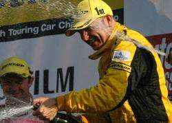 Inverness driver Dave Newsham celebrates his success at Snetterton