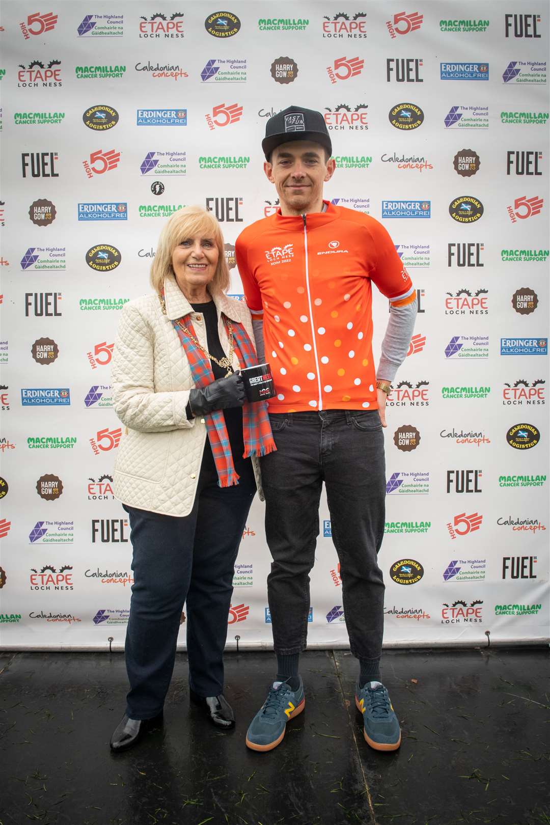 Andy Cunningham with Provost Helen Carmichael as he claimed the King of the Mountain title. Picture: Callum Mackay.