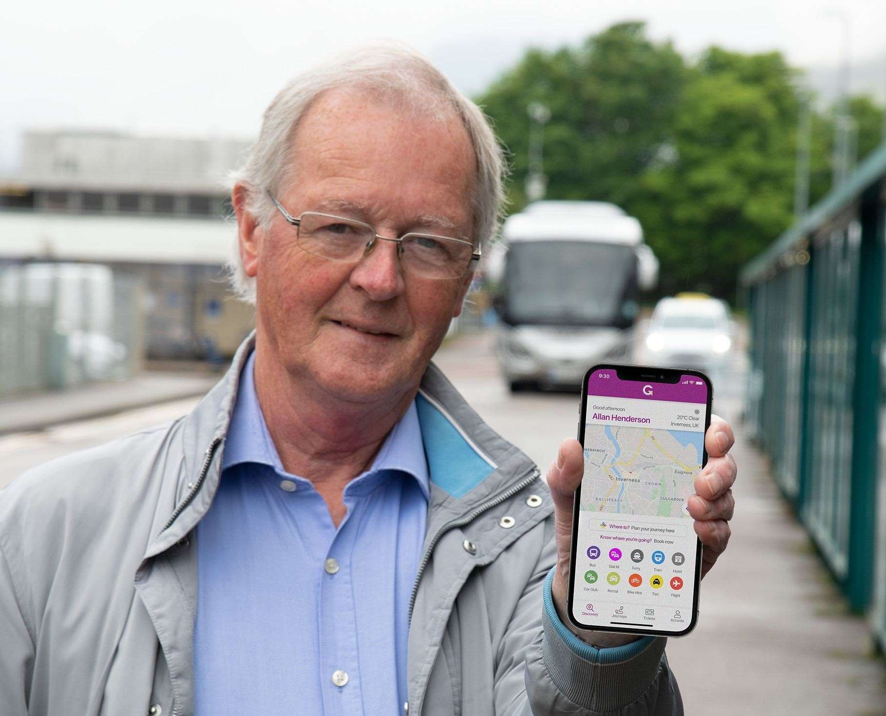 Councillor Allan Henderson, chairman of Hitrans, with the new app.