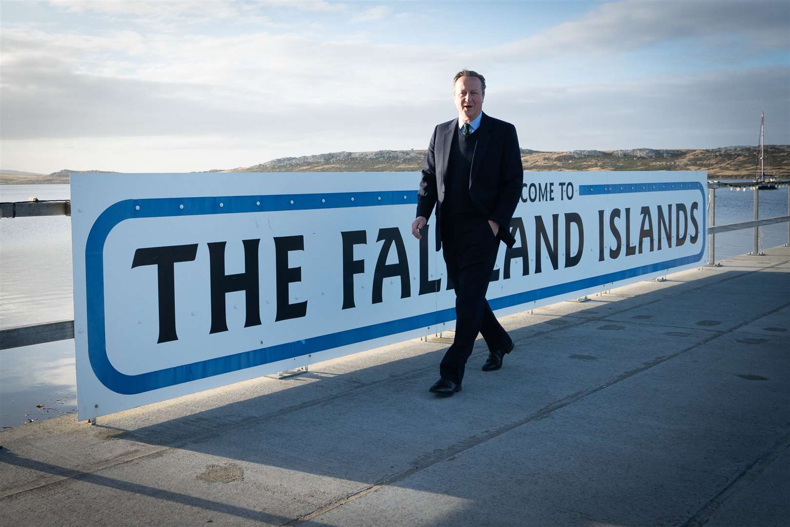 Foreign Secretary Lord David Cameron walks around Port Stanley on the Falkland Islands (Stefan Rousseau/PA)