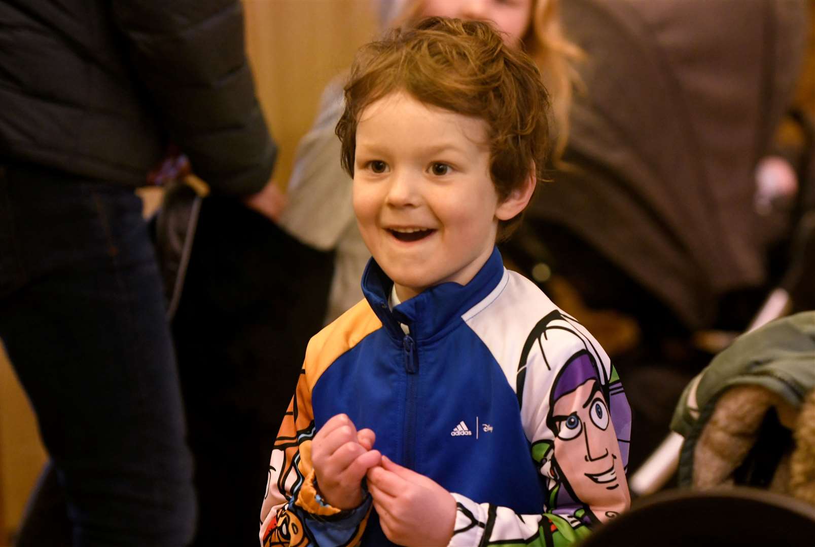 A youngster excited to see Woody & Buzz Lightyear