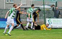 Lewis Mackinnon heads Buckie 2-0 in front against Clach, a goal that could have been prevented. Picture: Eric Cormack.