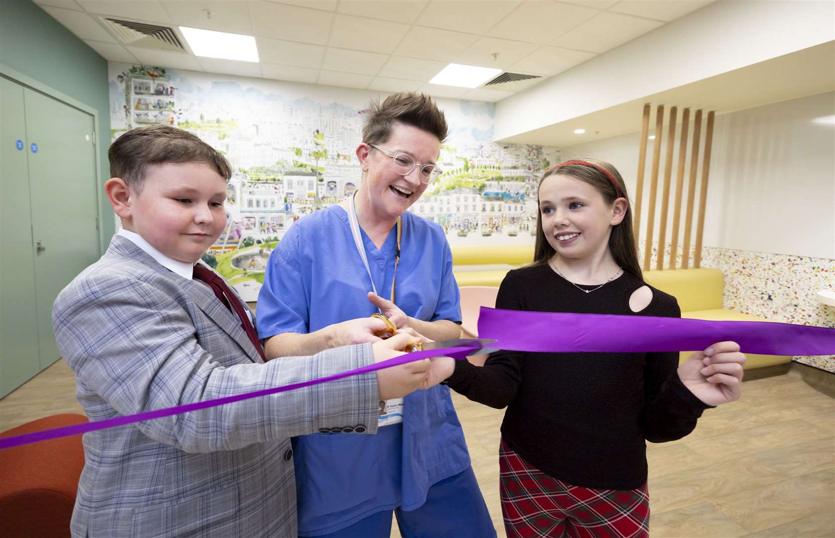 Dr Alyson Walker cutting the ribbon with Riley McLennan (9) and Scarlett Dougan (12) in Glasgow. Picture: Martin Shields