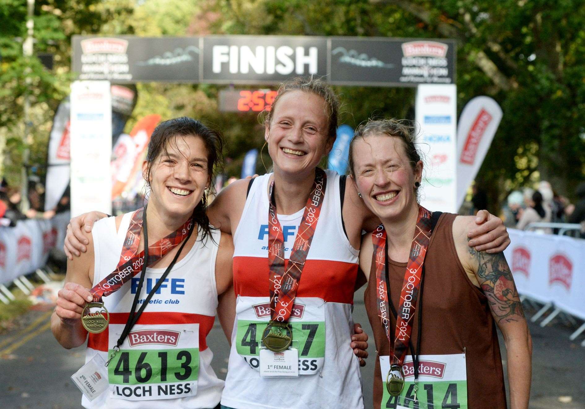 Loch Ness Marathon women's champion Megan Crawford with Sheena Logan (left) and Shona McIntosh. Picture: James Mackenzie.