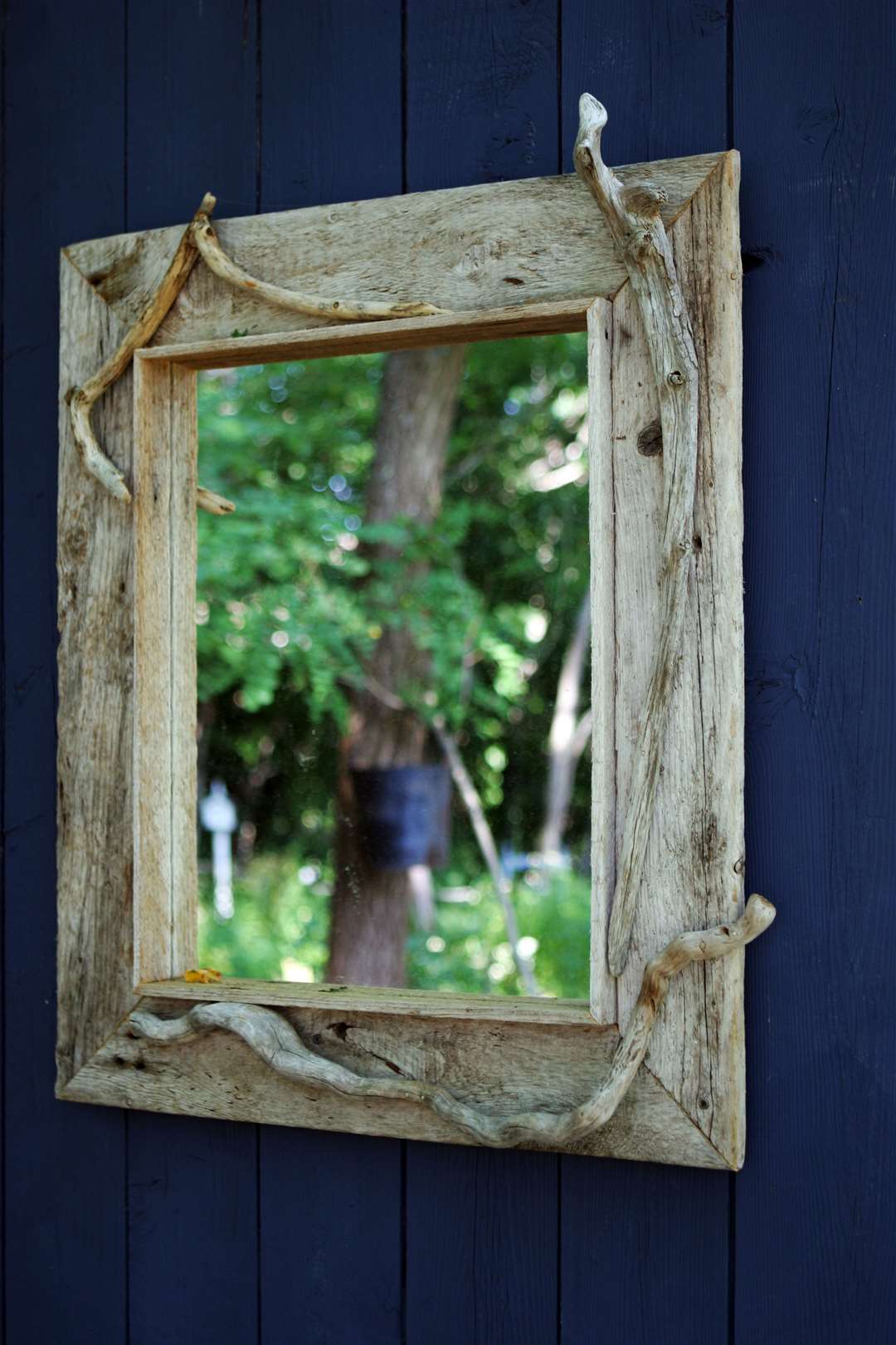 Use mirrors to reflect attractive greenery. Picture: iStock/PA