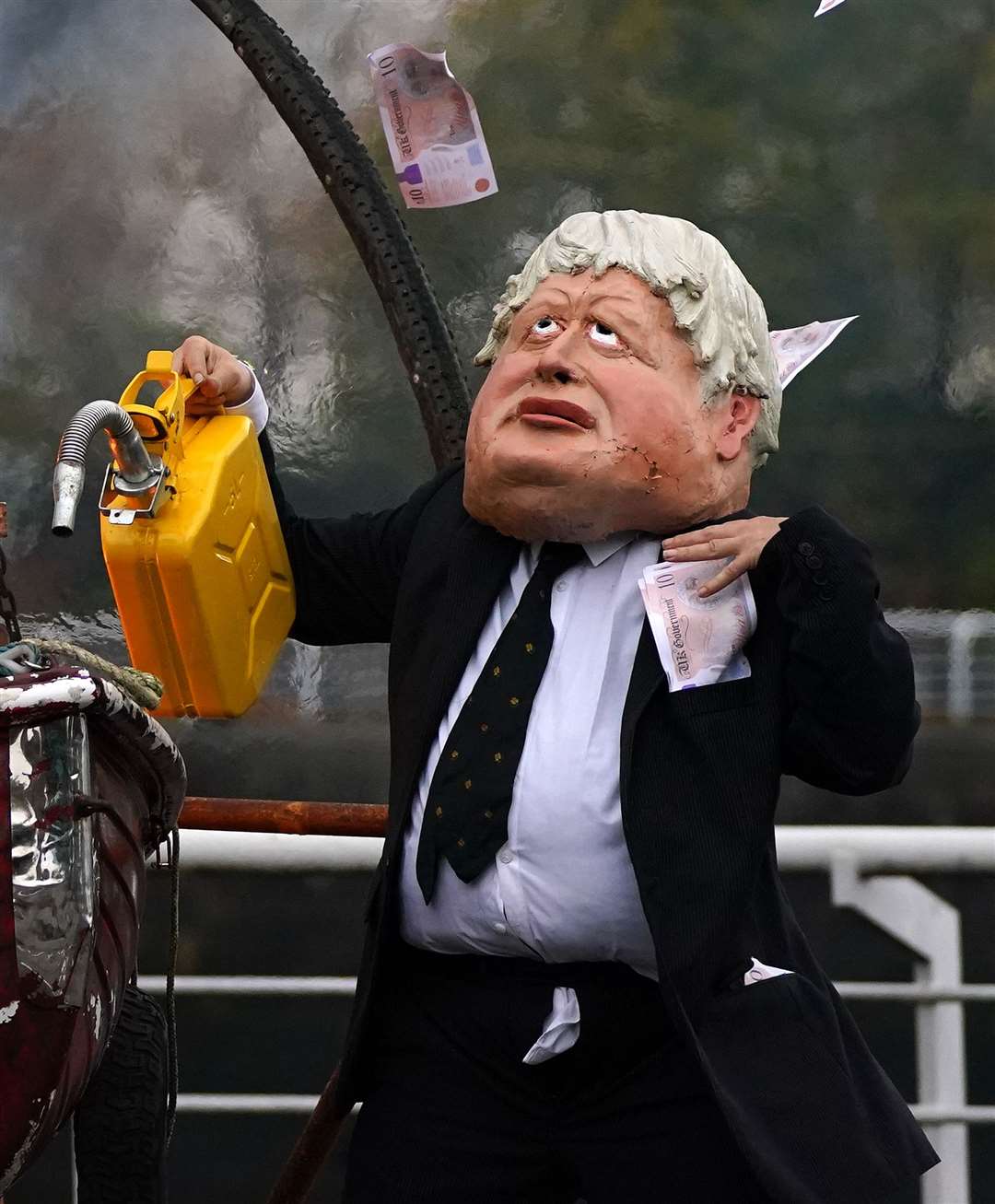 One protester was dressed up as Boris Johnson for the stunt (Andrew Milligan/PA)