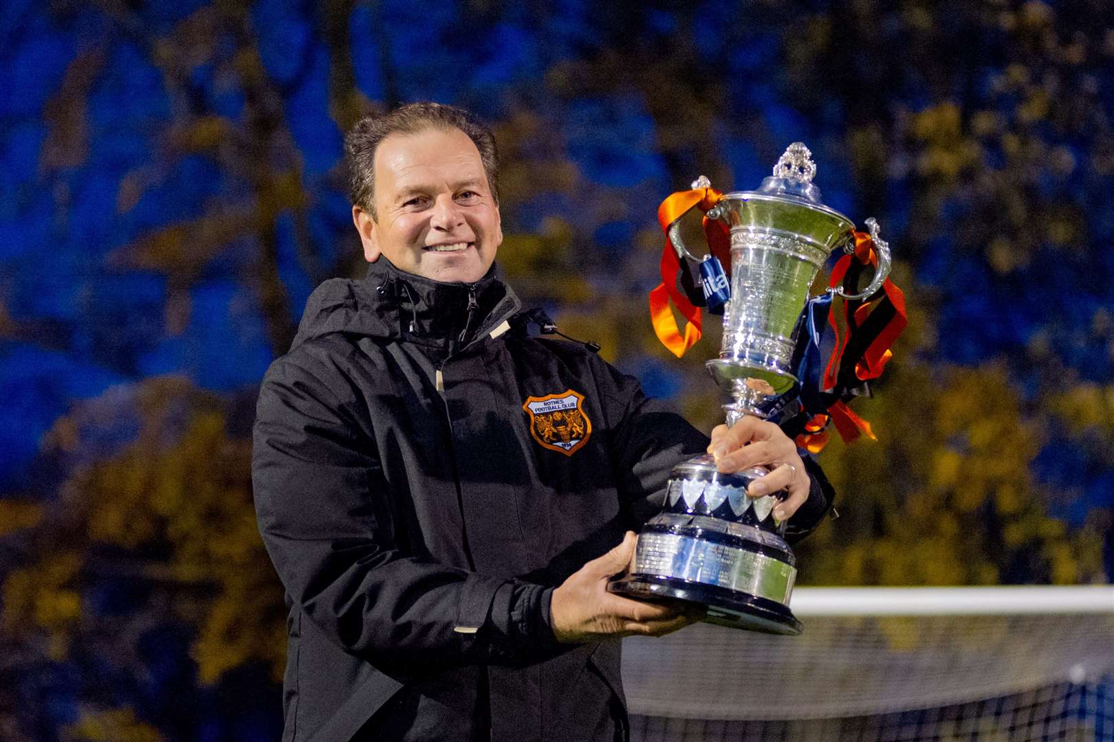 Rothes manager Ross Jack holding the Highland League Cup.