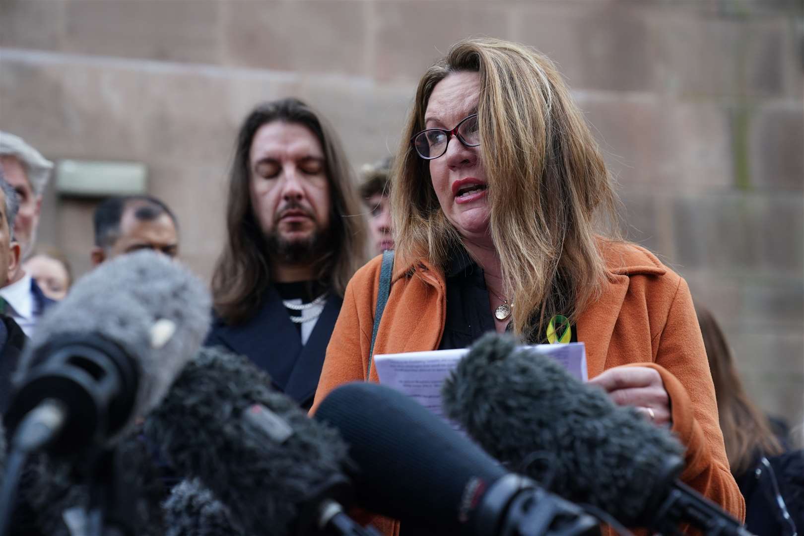 Emma Webber, mother of Barnaby Webber making a statement alongside relatives of the victims, outside Nottingham Crown Court (Jacob King/PA)