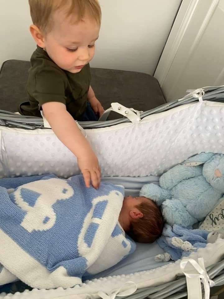 Big brother Lyle meets the new arrival.