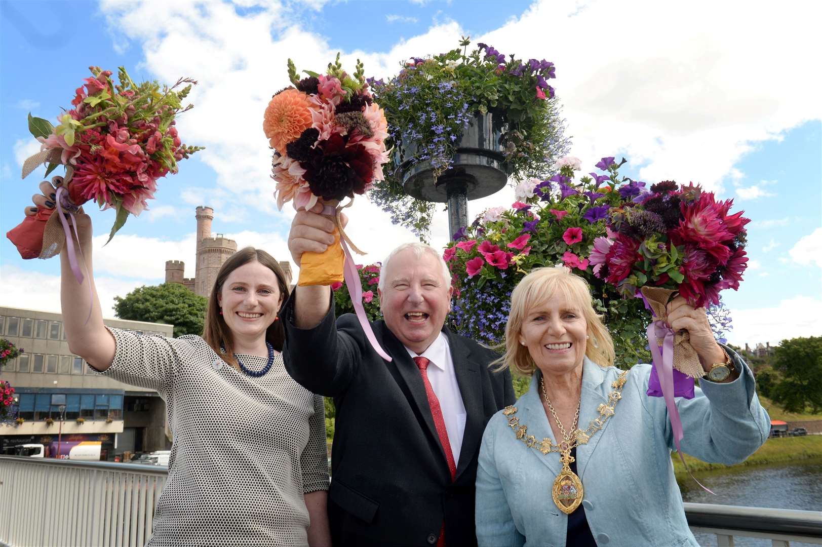 Mike joins High Life Highland’s Claire Marcello and Provost Helen Carmichael to admire the city’s floral display.