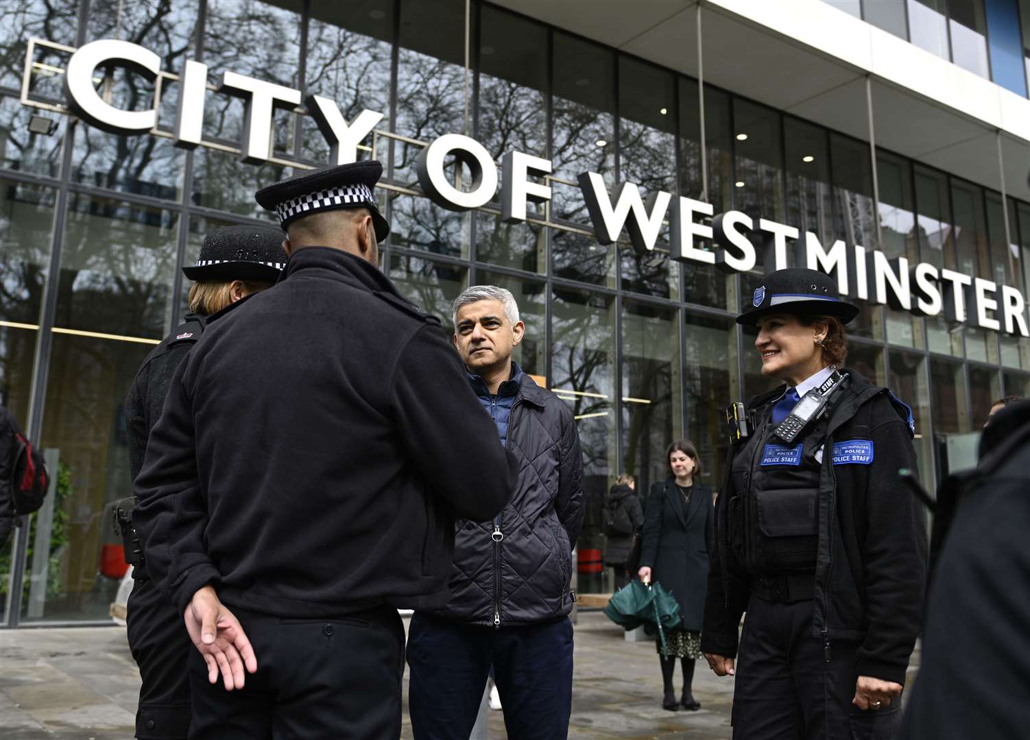 Mayor of London Sadiq Khan with officers from the Met (Annabel Lee-Ellis/PA)