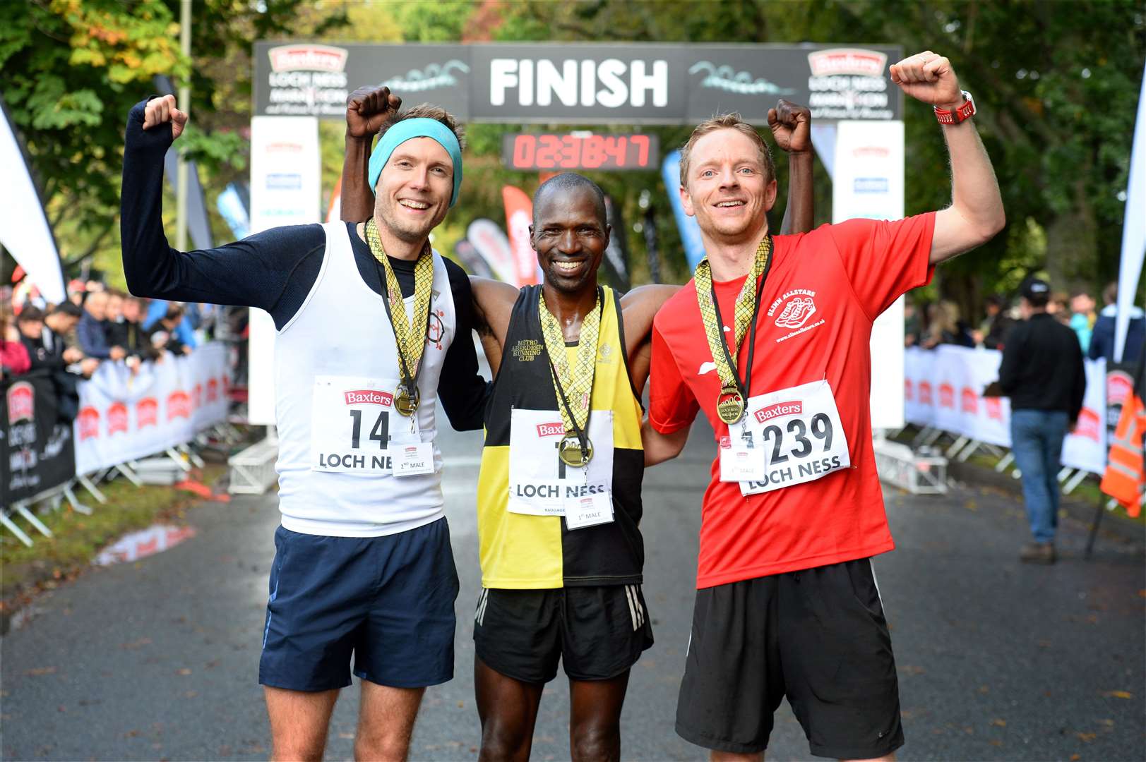 Isaiah Kosgei (centre) with Nick Harris-Fry (left) and Ed Rees (right) Picture: Gary Anthony.