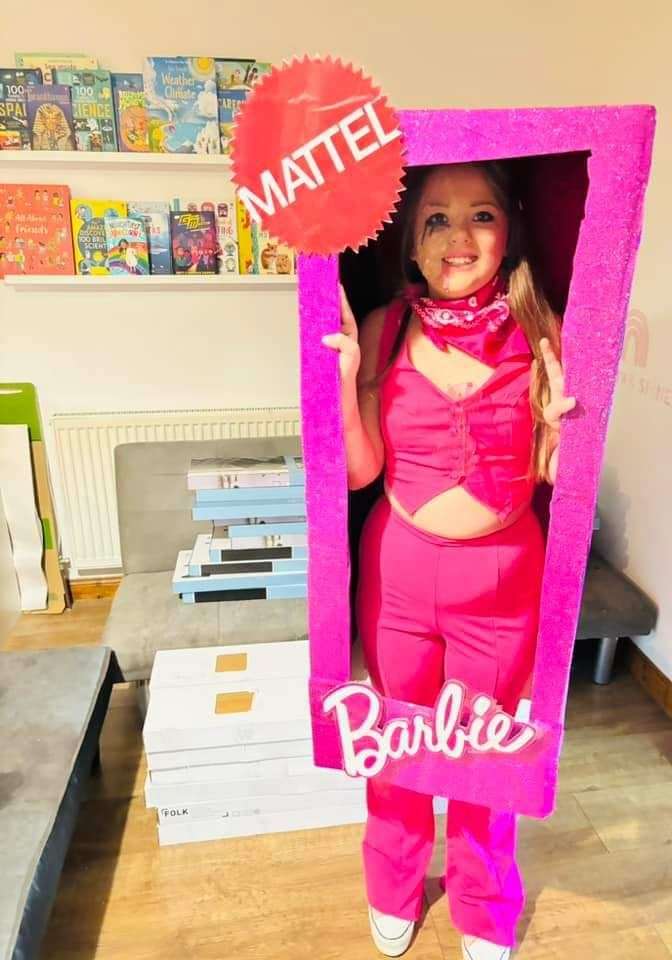 Katie dressed as a melted Barbie
