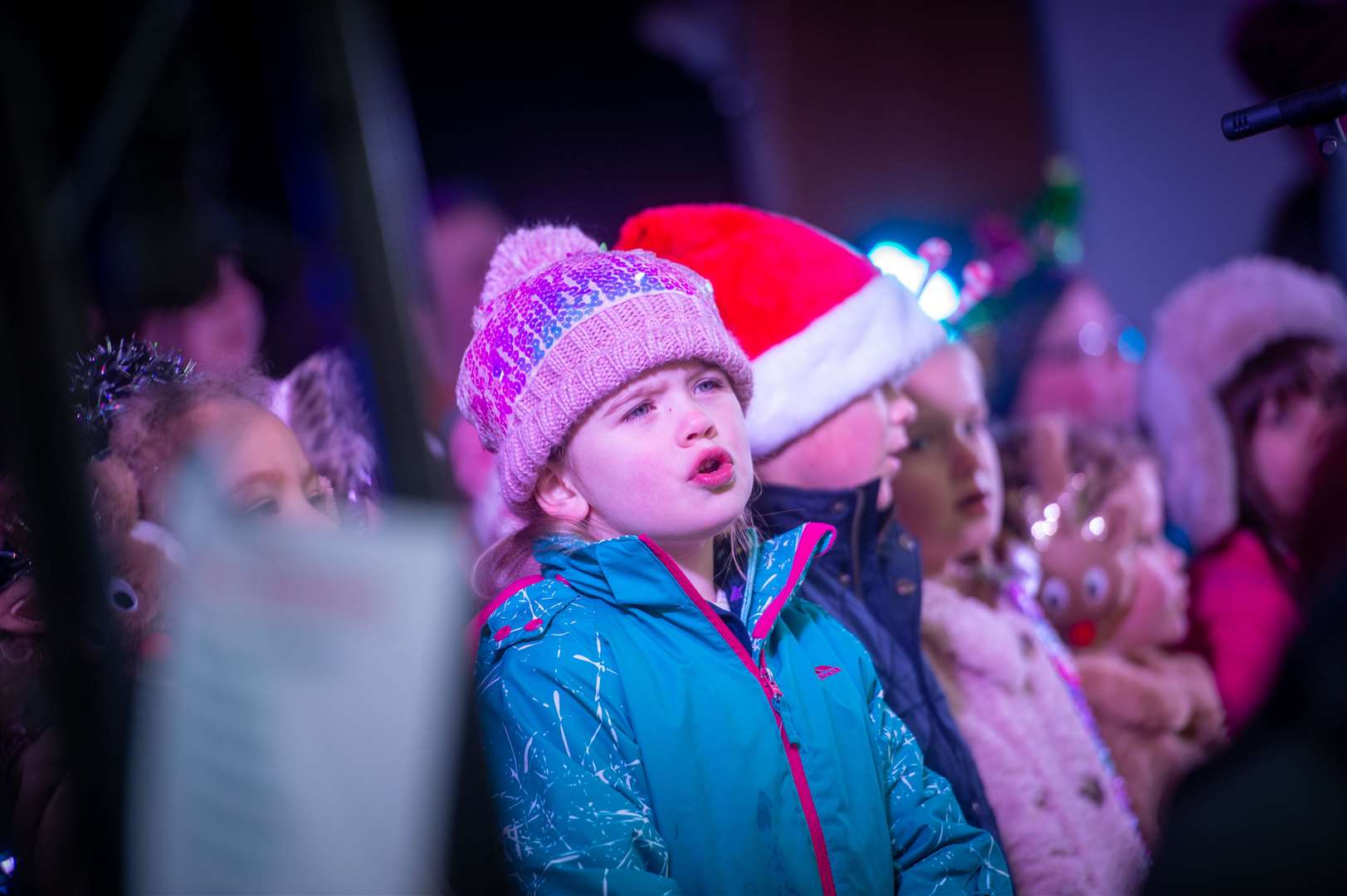 Children sang Christmas songs for the crowds. Picture: Callum Mackay