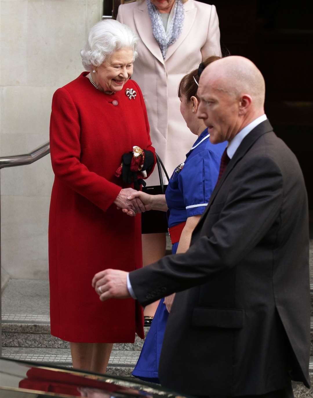 The Queen leaves King Edward VII’s Hospital in London in 2013 (Yui Mok/PA)