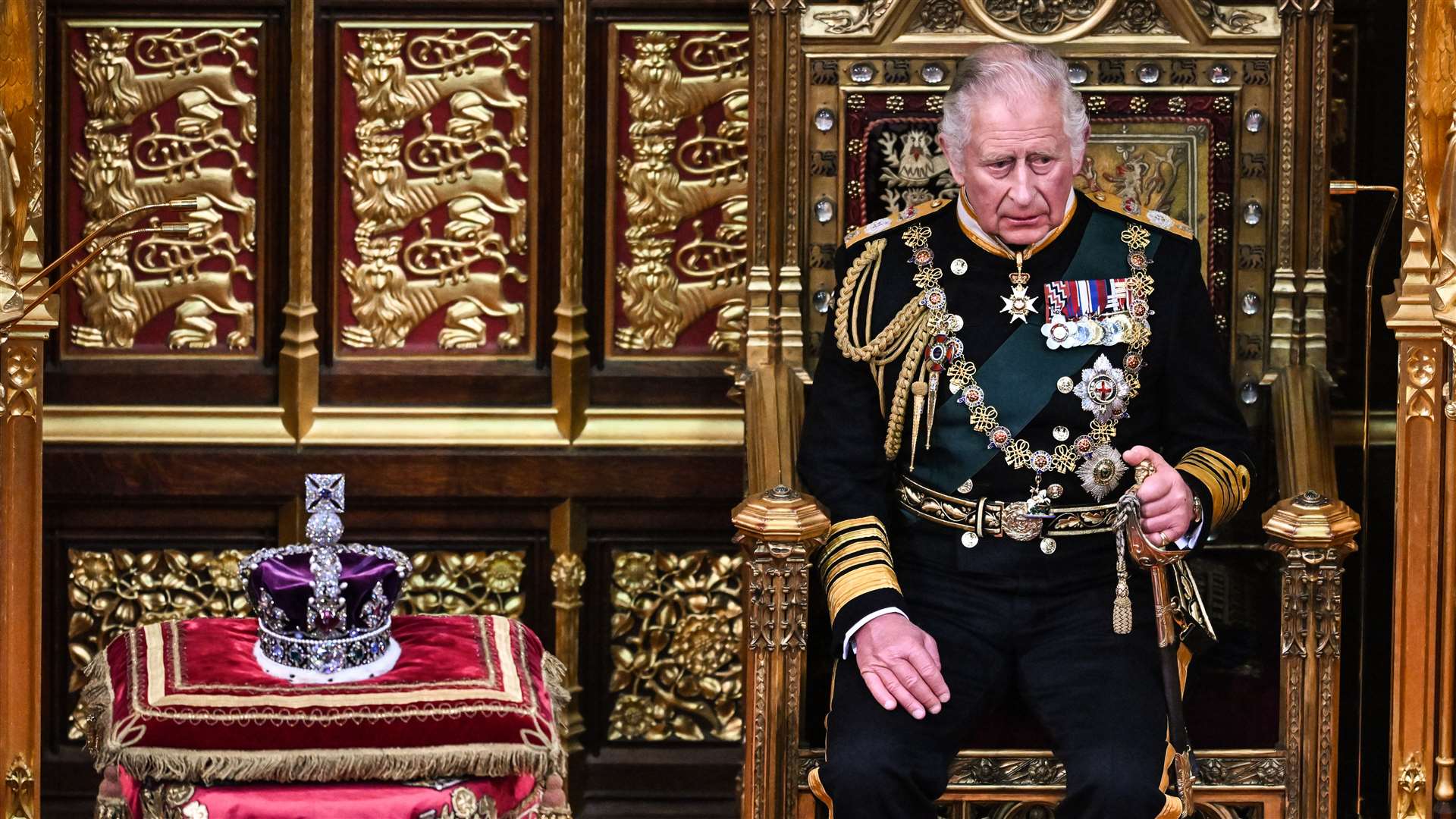 The Prince of Wales sits by the Imperial State Crown during the State Opening of Parliament in the House of Lords (Ben Stansall/PA)