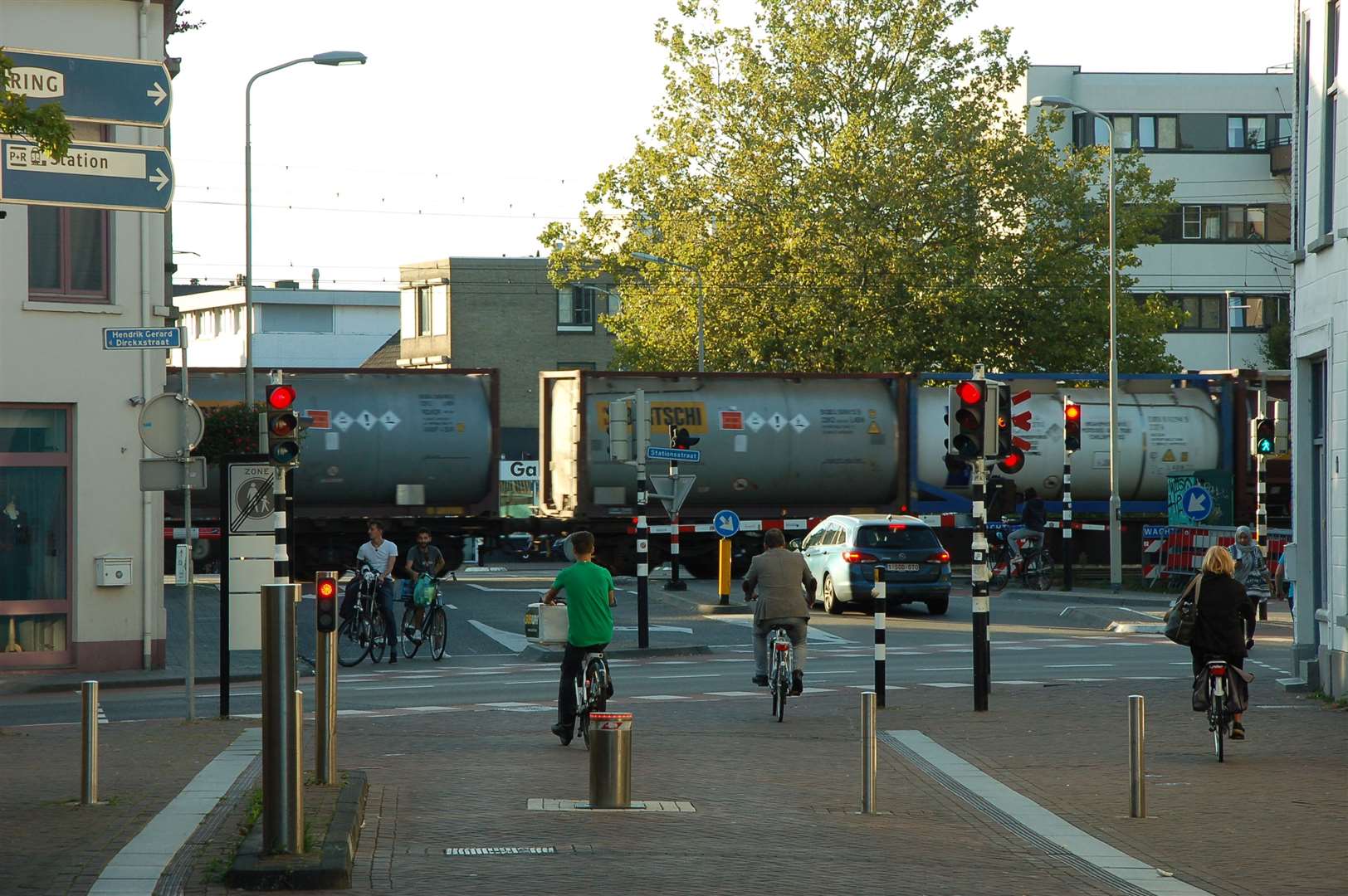 Yet another train disrupts traffic as it trundles through the middle of the town.