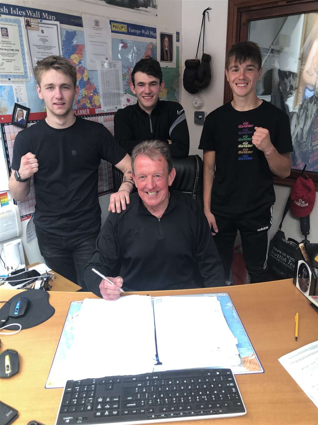 George Stewart, Callum Turnbull and Adian Williamson are turning pro under the guidance of Inverness City Boxing Club head coach Laurie Redfern.
