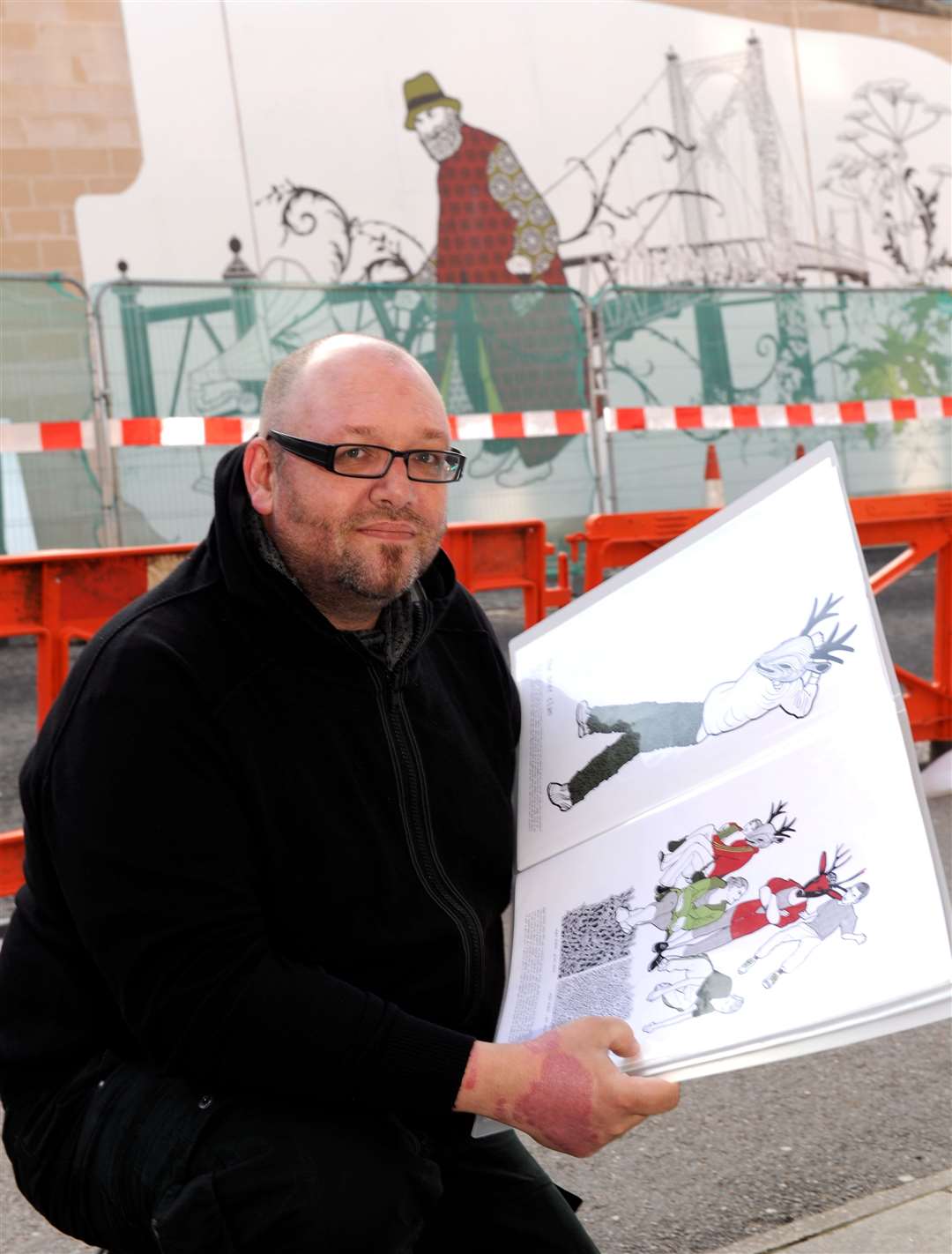 Artist Mike Inglis at the unveiling of his now removed mural.