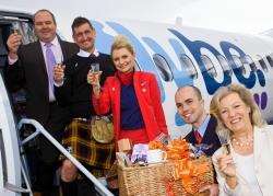 Lady Claire Macdonald (far right) helps toast the first flight