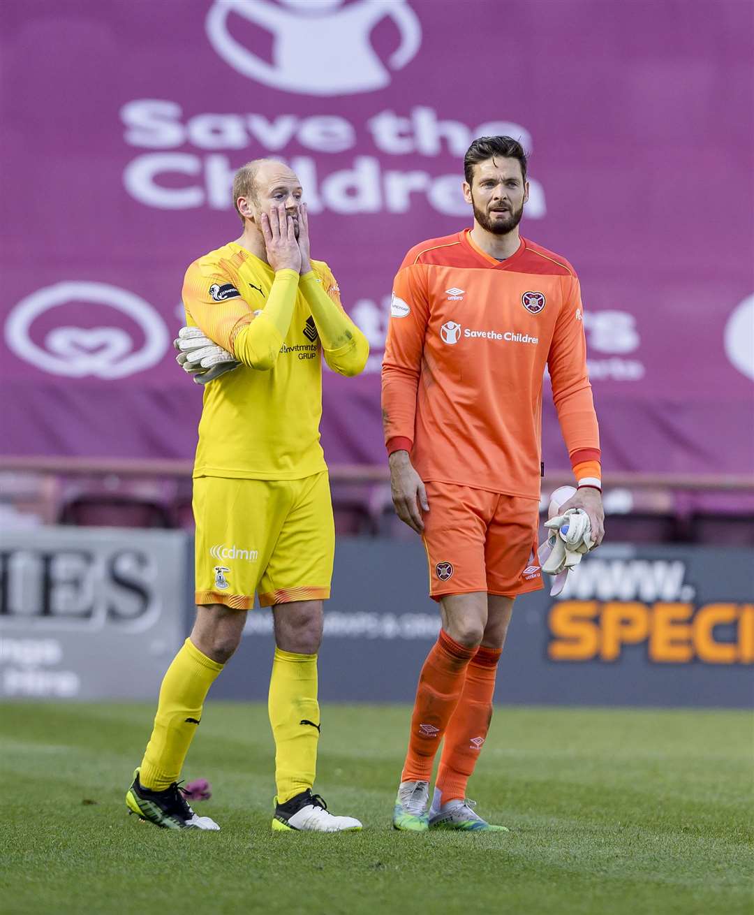 Picture - Ken Macpherson, Inverness. Hearts(3) v Inverness CT(0). 24.04.21. ICT 'keeper Mark Ridgers is consoled by Hearts 'keeper Craig Gordon at the end.