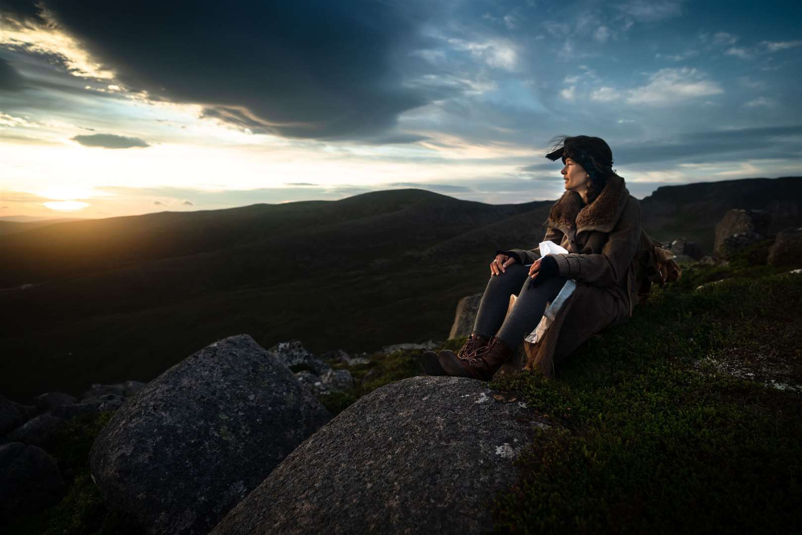 Elise takes in the sunset in the Cairngorms. Picture: PA Photo/Wilderness Scotland