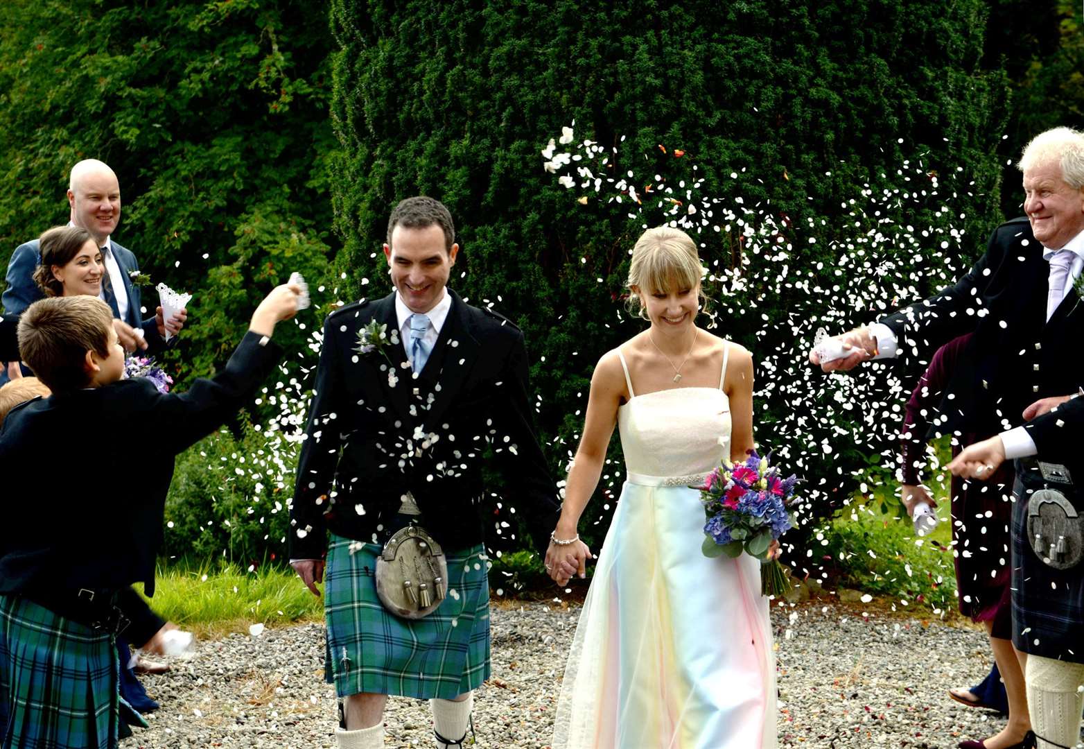 Castle Leod Wedding..Andrew Traill and Ashley Traill. Ashley Traill wore a specially designed rainbow dress to signify the year it is been and the bright hope of the future..Picture: James Mackenzie..