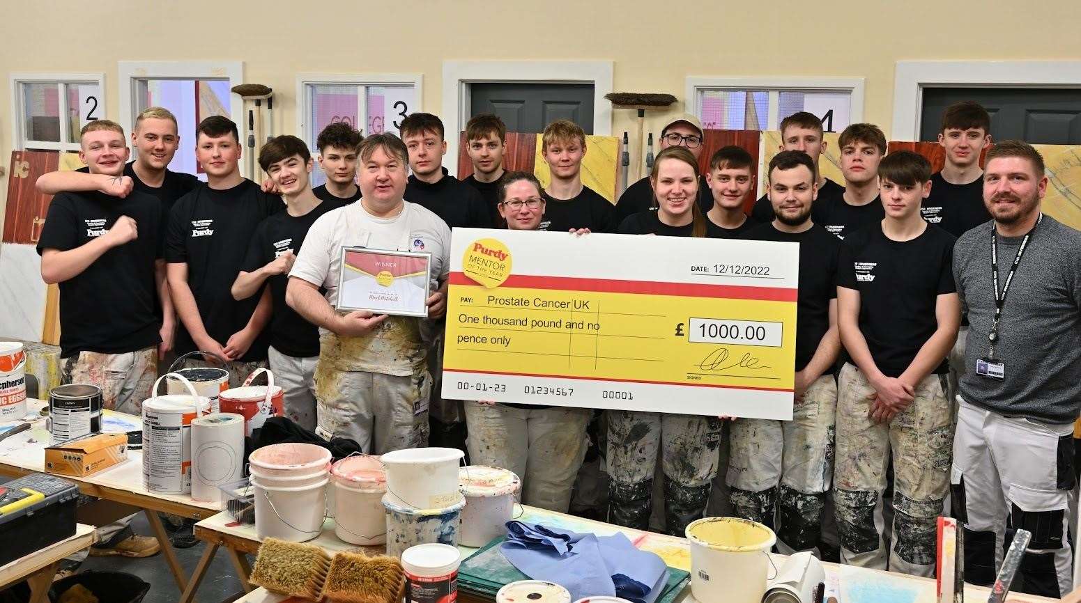 Mark Mitchell (centre) with the first-year painting and decorating apprentices and fellow painting and decorating lecturer Jordan Bryceland (far right). Picture: David Stewart