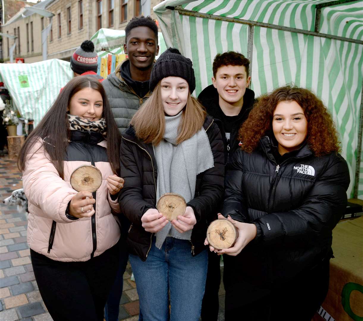 Leah Campbell, Juda Mzamu, Amy Forbes, Jack Henderson and Morgan Earras from Millburn Academy were selling wooden coasters at their Origin stall.