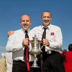 Glenurquhart joint managers Fraser Mackenzie (left) and Drew MacNeil with the MacAulay Cup. Picture Neil G Paterson