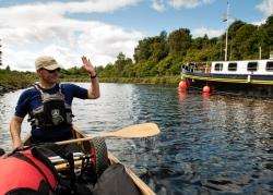 Paddlers give larger craft on the canal room. Picture courtesy Great Glen Canoe Trail