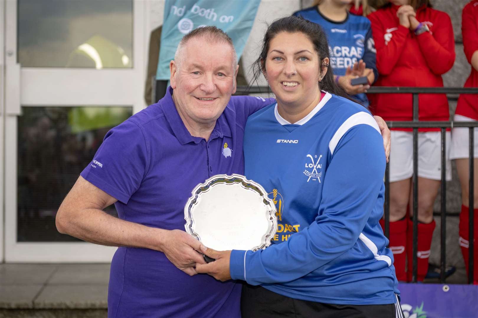 Lovat's Carrie Rennie receives the Player of the Match Salver from Peter Gow. Picture: Neil Paterson