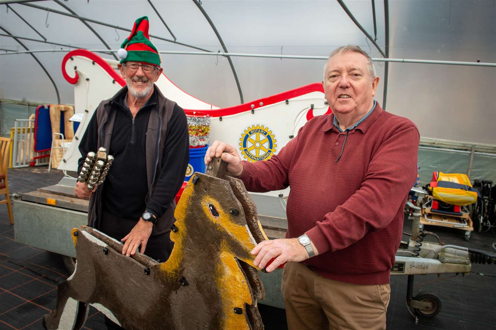 Derek McRae and John Harrison, of Inverness Culloden Rotary Club, prepare the sleigh.