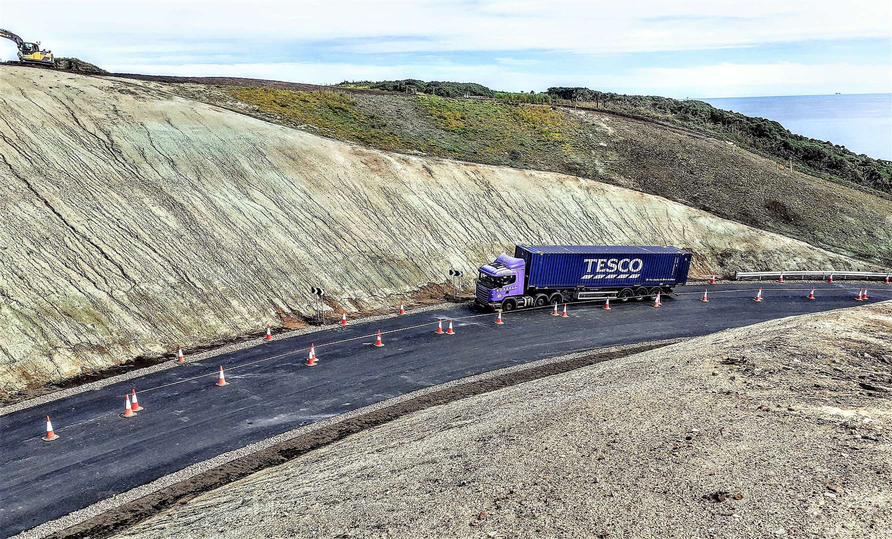 Another view of the new road alignment at Berriedale as a lorry makes its way past. Picture: Derek Bremner