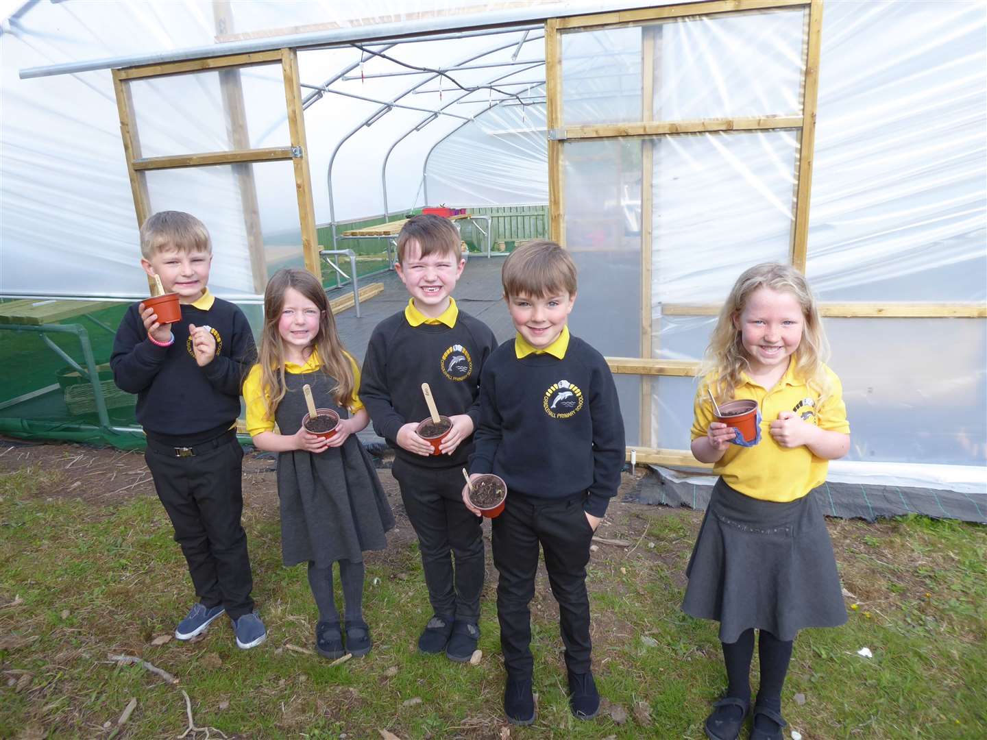 Cradlehall Primary school youngsters in their new poly-tunnel