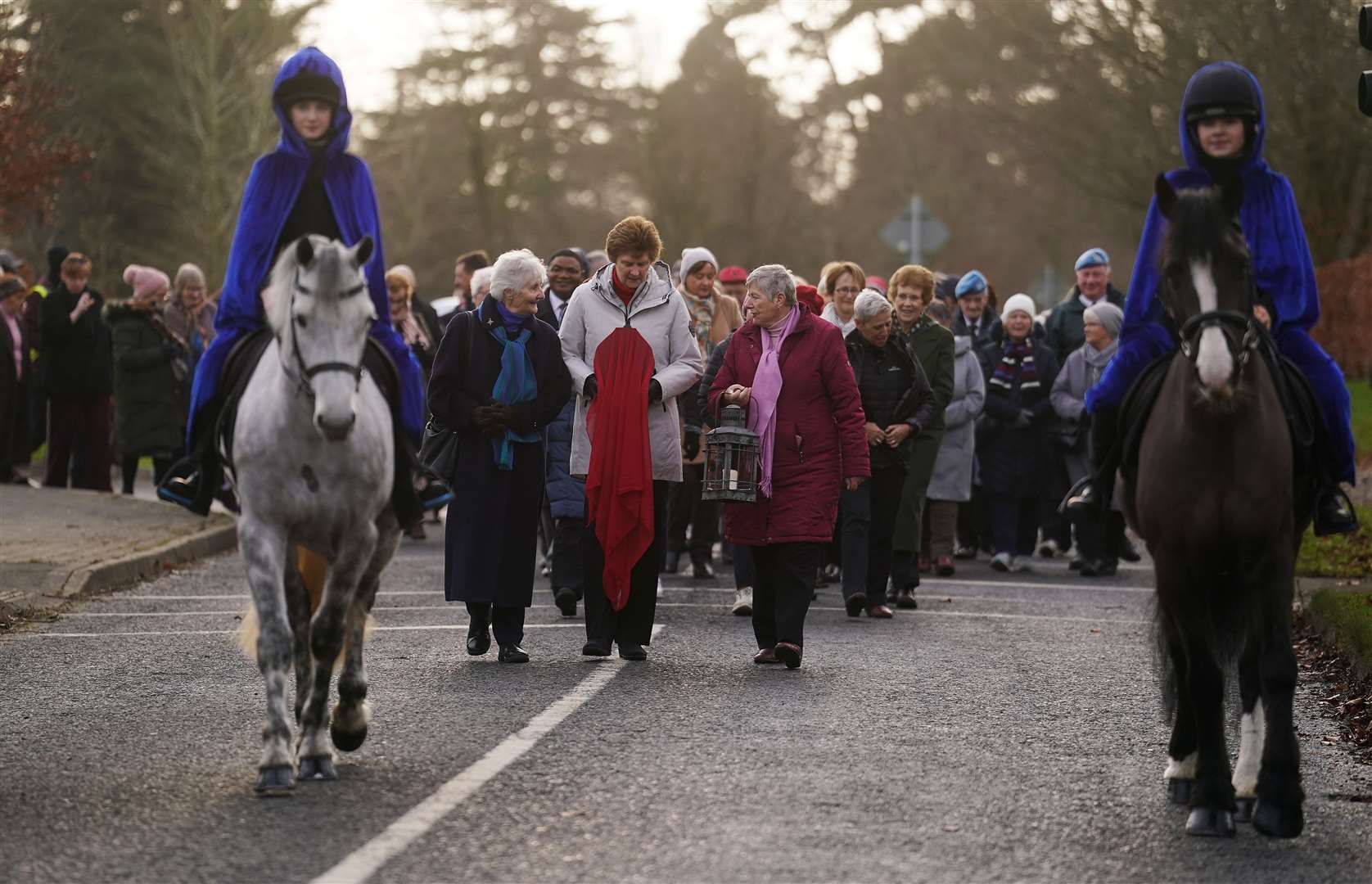 The relic of St Brigid was taken to the local church in a procession (Brian Lawless/PA)