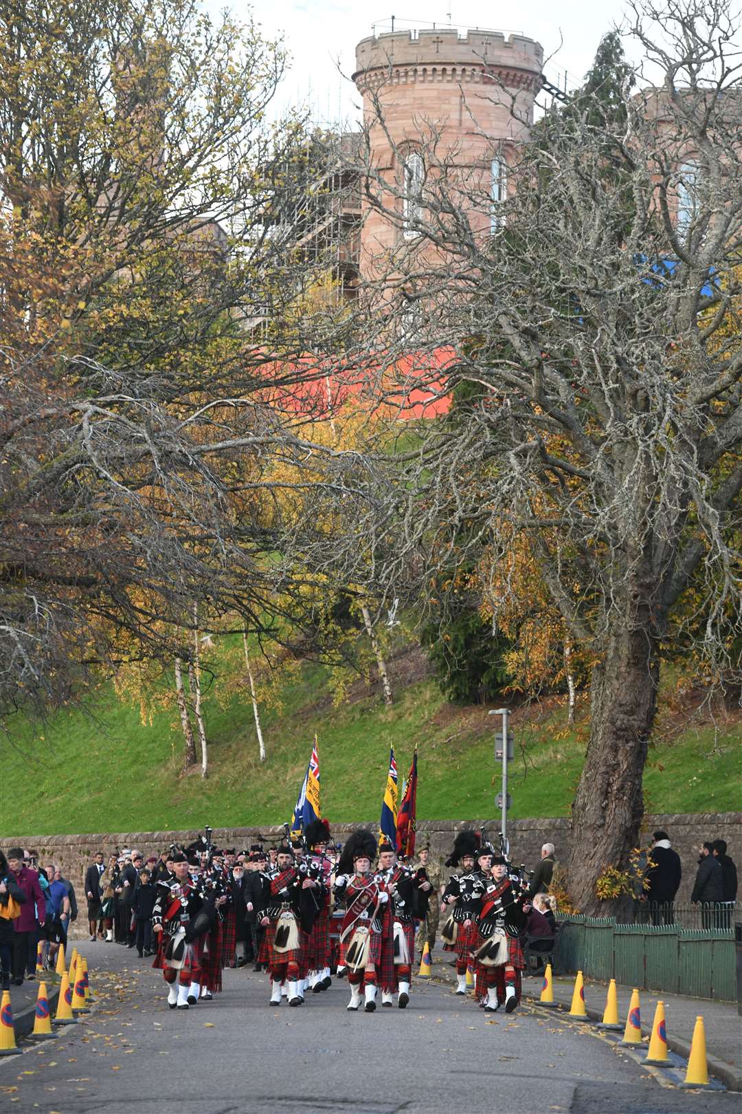 The parade marches below Inverness Castle.