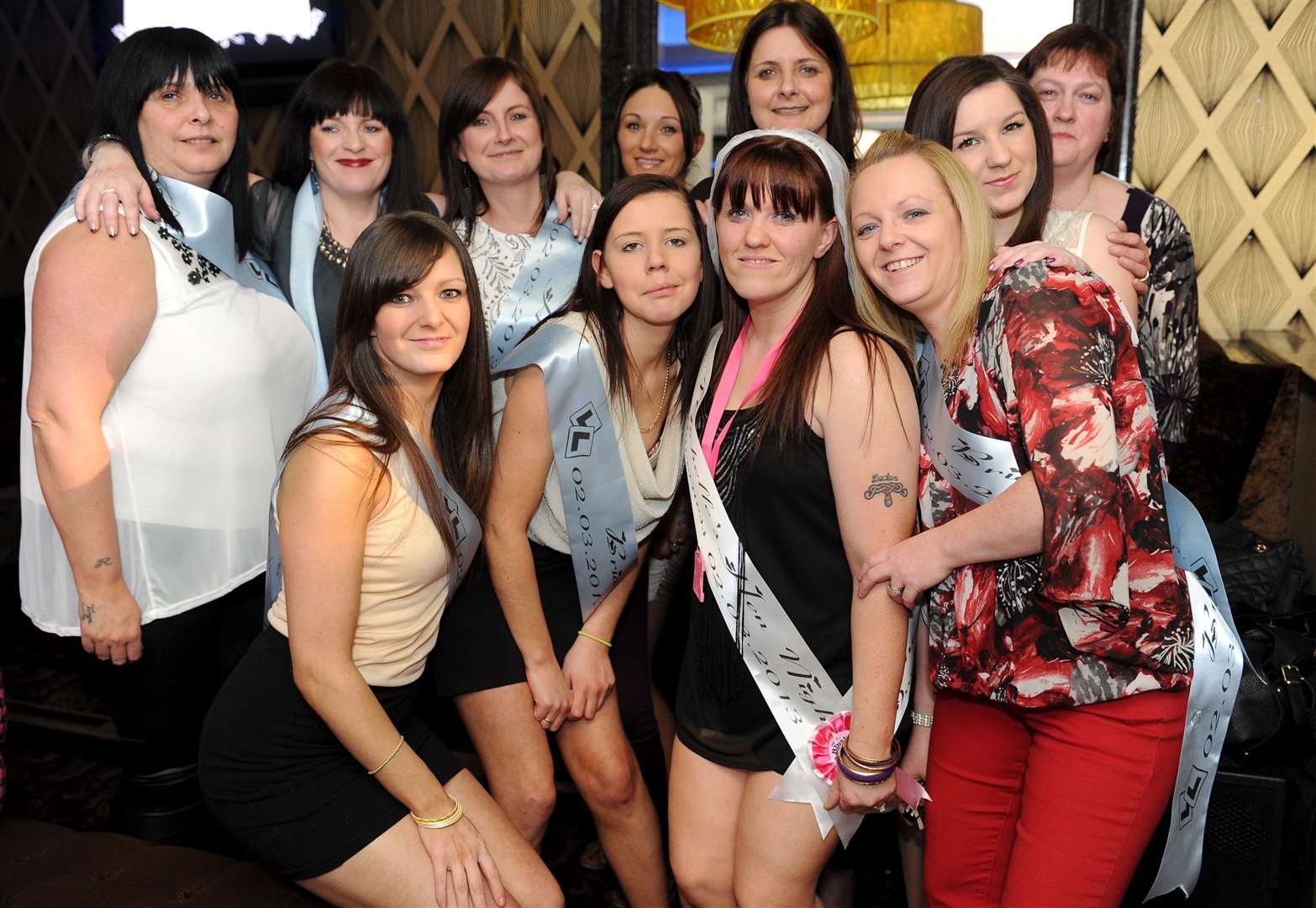 Cityseen Michellle Robertson (centre,vail ) with friends and family on her Hen night Picture: Gary Anthony